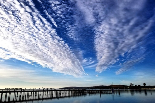 Clouds over dock in Bodega Bay