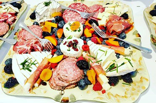 Party plater with salami, cheese and fruit